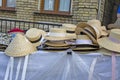 market stall with straw hats. Big group of authentic panama hats or paja toquilla hats made from straw at craft market img Royalty Free Stock Photo