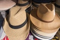 market stall various stacks straw hats tablecloth