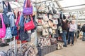 Market stall vendor selling fashion accesories and handbags