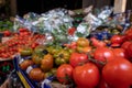 Market stall with fresh tomatoes for sale, at Borough Market, urban covered market in Southwark, east London UK. Royalty Free Stock Photo