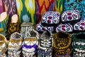 Market stalls with decorative tribal textile with colourful pattern made in Central Asia, Uzbekistan.