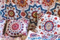 Market stalls with decorative tribal textile with colourful pattern made in Central Asia, Uzbekistan.