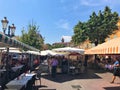 Market stalls and people at Cours Saleya, Nice, South of France Royalty Free Stock Photo