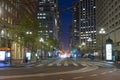 Market Street with it`s tram lines and skyscrapers at dusk in San Fransisco, US