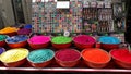 A bustling market stall selling colourful dyes in Pushkar, India