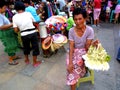 Market vendor selling flowers in quiapo in the philippines