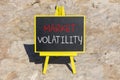 Market volatility symbol. Concept words Market volatility on beautiful black chalk blackboard. Chalkboard. Beautiful stone Royalty Free Stock Photo