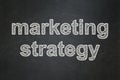 Marketing concept: Marketing Strategy on chalkboard background Royalty Free Stock Photo