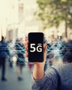 Marketing hand holding 5G internet connection smartphone. New mobile phone generation, powerful device presentation. Technology Royalty Free Stock Photo