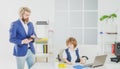 Marketing team meeting brainstorming research. Cute kid sitting in office chair self confident like big boss, funny Royalty Free Stock Photo