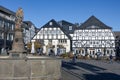 Marketplace medieval German city Brilon with fountain and medieval houses