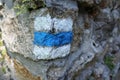 Marking the blue trail on the stone