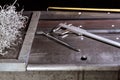 Marking on a metal surface for drilling holes with a square and vernier calipers