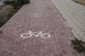 Marking sign Bicycle path on the curb.