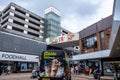 Marks And Spencer FoodHall And Pop Up Cafe In A Shopping Square With People And Shoppers