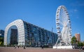 Markthal Rotterdam, Netherlands. Ferris wheel and people walking around