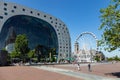 Markthal Rotterdam, Netherlands. Ferris wheel and people walking around