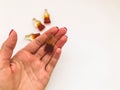 Marmalade candies. sweets in the shape of a bottle of lemonade lie on the hand of a girl with a red manicure. delicious, chewy Royalty Free Stock Photo