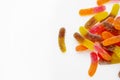 Marmalade worms on a white background. Sweets. Unhealthy food.
