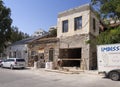 Marmari, Evia island, Greece. August 2020: Old crumbling houses on the waterfront of a Greek resort town on the Aegean sea