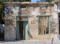 Marmari, Evia island, Greece. August 2020: Old crumbling houses on the waterfront of a Greek resort town on the Aegean sea