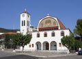 Marmari, Evia island, Greece. August 2020: St. George`s Church with a chapel and bell tower on the waterfront of the resort town