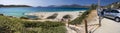 Marmari, Evia island, Greece. August 2020: View of a Grand sandy beach in the Aegean sea with holidaymakers and tourists on the Gr Royalty Free Stock Photo