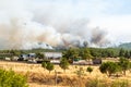 Smoke from a forest fire rising over Marmaris resort town of Turkey Royalty Free Stock Photo