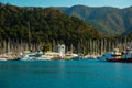 MARMARIS, TURKEY: Lighthouse and sailing yachts in the port of Marmaris Royalty Free Stock Photo