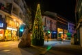 MARMARIS, TURKEY: Christmas tree and monument in the form of a rock with seagulls on the street at night.