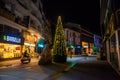 MARMARIS, TURKEY: Christmas tree and monument in the form of a rock with seagulls on the street at night.