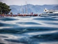 Marmaris, Turkey - May 21, 2018: Sea surface, waves, mountain coast in the distance and ship. Sshooting from water