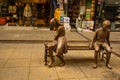 MARMARIS, TURKEY: A modern monument of a girl and a boy on a bench on the street in Marmaris.