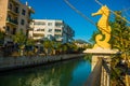MARMARIS, TURKEY: Sculpture of a Seahorse and a Frog on the street by the canal in Marmaris on a sunny day.
