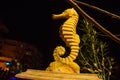 MARMARIS, TURKEY: Sculpture of a Seahorse on the street by the canal in Marmaris at night.