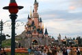 Sunset At Sleeping Beauty Castle At Disneyland Paris With Crowd Royalty Free Stock Photo