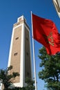 Maroccan tower and flag Royalty Free Stock Photo