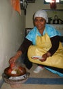 Maroccan Woman cooking traditional Tajine at home