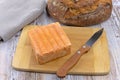 Maroilles cheese on a cutting board Royalty Free Stock Photo