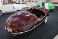 Detail of Maroon Reina Junior three-wheeled car