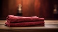 Maroon Towel On Wooden Table: A Captivating Study In Early Towel Design