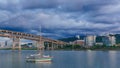 Marquam Bridge over Willamette River with boats in Portland, USA