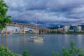 Marquam Bridge over Willamette River with boats in Portland, USA