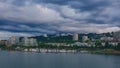 Marquam hill and buildings over Willamette River with boats in Portland, USA