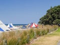 Marquees and people erected at beach event