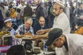 Marrakech; may, 14, 2016: chef serving typical moroccan food at a restaurant market in the Jemaa el Fna square in Marrakech where