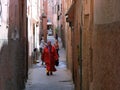 People walking in one of the narrow streets of Marrakech. Morocco