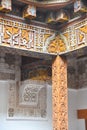 Marrakech, Morocco - Feb 10, 2023: Beautiful handicraft work inside the koranic school Medersa Ben Youssef in Marrakech