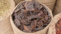 Marrakech, Morocco - Feb 8, 2023: Dried Carob pods. Moroccan Culinary Arts Museum Royalty Free Stock Photo