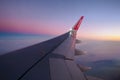 Marrakech, Morocco - January 9th, 2020: View from passenger window of Air Arabia airlines Airbus 320 commercial airplane, sunset